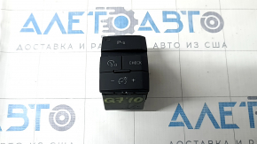 The Audi Q7 4L parking assist and instrument panel lighting button has 10-15 dents.