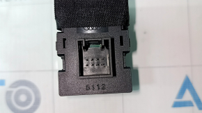 The Audi Q7 4L parking assist and instrument panel lighting button has 10-15 dents.
