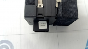 The Audi Q7 4L parking assist and instrument panel lighting button has 10-15 dents.