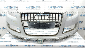 Bare front bumper for Audi Q7 4L 10-15 with parking sensors, white, dents, scratches, broken fasteners