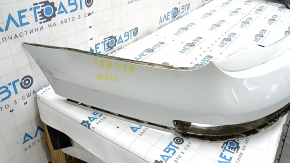The rear bumper, bare upper part, Audi Q7 4L 10-15, white, with absorber, scratches