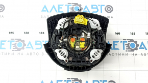 The steering wheel airbag for the driver's side of the Audi Q7 4L 10-15 is black, the chrome is peeling, and there is a scratch.