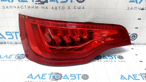 Left headlight of Audi Q7 4L 10-15 scratches