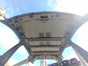 Metal roof for a Jeep Compass 17-24 without a sunroof, dented on the body.