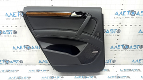 Rear left door panel assembly for an Audi Q7 4L 10-15, black with black leather insert, plastic armrest, glossy wood molding, BOSE, with backlighting, broken mount, tears, scratches