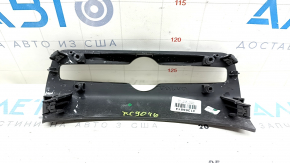 Volvo XC90 16-23 wood-grain center lower dashboard trim, glossy, scratches