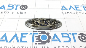 The front bumper emblem badge of the Ford Fusion mk5 13-20 is broken.