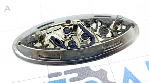 The front bumper emblem badge of the Ford Fusion mk5 13-20 is broken.