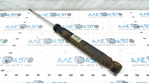 The rear left shock absorber for the Audi Q5 8R 13-17 is rusty.
