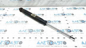 The rear right shock absorber of the Audi Q5 8R 13-17 is rusty and dented.