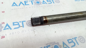 Front right axle shaft of Volvo XC90 16-22 T5, T6 AWD, rusty, torn boot on outer CV joint