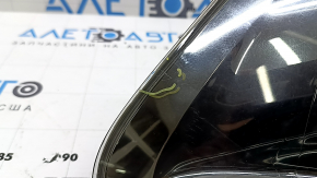 The outer taillight on the left wing of a Lexus RX350 RX400h 06-07 is dark, with spider webs and scratches.