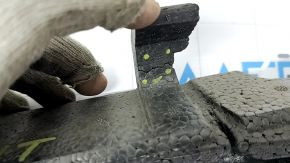 The front bumper absorber for the Audi Q5 8R 13-17 is pressed in place and has cracks in the mountings.