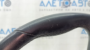 The steering wheel is bare, BMW 5 G30 17-22, black leather, Sport, heated, with a signal plate, under the paddle shifters, peeling, needs cleaning, scratches