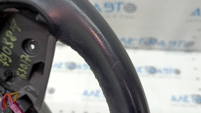 The steering wheel is bare, BMW 5 G30 17-22, black leather, Sport, heated, with a signal plate, under the paddle shifters, peeling, needs cleaning, scratches