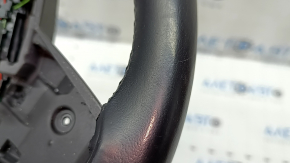 The steering wheel is bare, BMW 5 G30 17-22, black leather, Sport, heated, with a signal plate, under the paddle shifters, peeling, needs cleaning, scratches