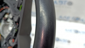 The steering wheel is bare, BMW 5 G30 17-22, black leather, Sport, heated, with a signal plate, under the paddle shifters, peeling, needs cleaning, scratches