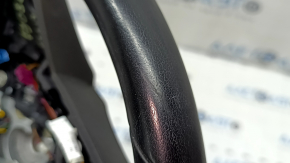 The steering wheel is bare, BMW 5 G30 17-22, black leather, Sport, heated, with a signal plate, under the paddle shifters, peeling, needs cleaning, scratches