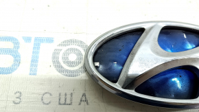 The Hyundai Sonata 11-15 hybrid trunk lid emblem has a dented backing.