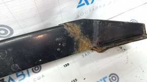 The front bumper reinforcement for a Toyota Camry V40 is rusty.