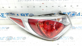 Left outer fender light of a Hyundai Sonata 11-15 hybrid, scratches