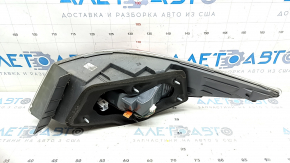 Left outer fender light of a Hyundai Sonata 11-15 hybrid, scratches
