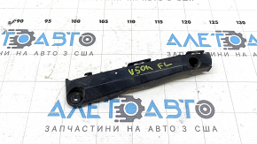 The left front bumper mount for a Toyota Camry V50 12-14 USA is broken.