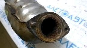 The rear exhaust manifold with a catalytic converter for a Lexus RX400h 06-08 is rusty and missing one stud.