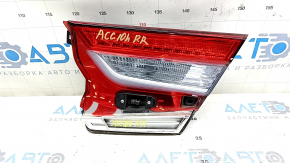 The right interior tailgate light of a Honda Accord 18-20 hybrid has a broken window.