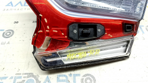 The right interior tailgate light of a Honda Accord 18-20 hybrid has a broken window.