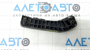 The left front bumper mount on a Toyota Camry v40 has a broken latch.