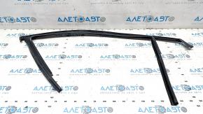 Upper front left door molding for a 13-16 Dodge Dart, black, with glass seal