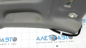 The headliner of a Toyota Camry v40 10-11 is gray, under the sunroof, creased, needs cleaning, the wiring is cut, the fabric is peeling off