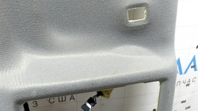 The headliner of a Toyota Camry v40 10-11 is gray, under the sunroof, creased, needs cleaning, the wiring is cut, the fabric is peeling off