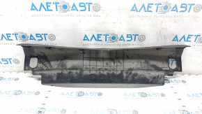 The trunk opening trim of the Cadillac CTS 14-19 is worn and scratched.