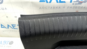 VW Jetta 19-24 trunk opening trim, black, scratches