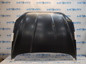 The hood of a Ford Fusion mk5 13-20 aluminum is bare, with dents on the edges.