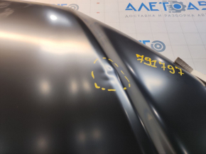 The hood of a Ford Fusion mk5 13-20 aluminum is bare, with dents on the edges.