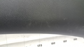 The center trim panel of the trunk door of the Toyota Prius 50 Prime 17-22 is black and worn.