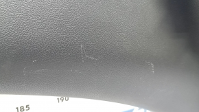 The center trim panel of the trunk door of the Toyota Prius 50 Prime 17-22 is black and worn.