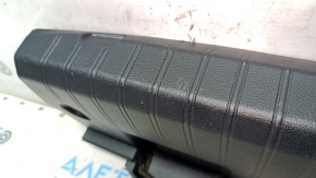 The trunk opening trim of a Subaru Legacy 15-19 is worn and scratched.