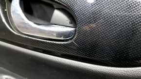 Rear right door panel for Nissan Rogue 14-16, black with black plastic insert, black leather armrest, glossy carbon molding, scratches