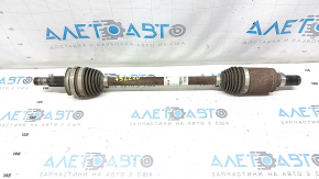 The rear left half shaft of a Ford Escape MK4 20-24 is rusty.