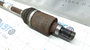The rear left half shaft of a Ford Escape MK4 20-24 is rusty.