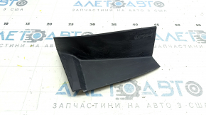 The outer wing light cover on the left VW Jetta 19-24 has broken fasteners.