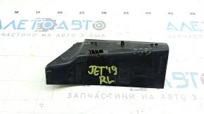 The outer wing light cover on the left VW Jetta 19-24 has broken fasteners.