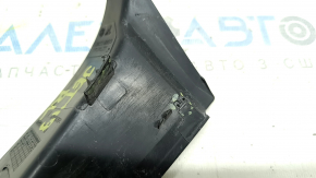 The outer wing light cover on the left VW Jetta 19-24 has broken fasteners.