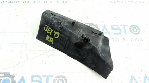 The right outer wing light cover for a VW Jetta 19-24 has broken fasteners.