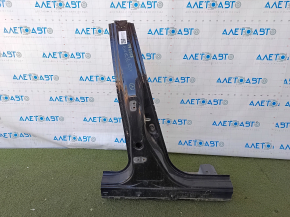 The center right body pillar of a Honda Civic X FC 16-21 4d is sawn off, dented, and dented.