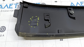 The rear center roof lining for a Toyota Prius 50 Prime 17-19 has a broken mount.